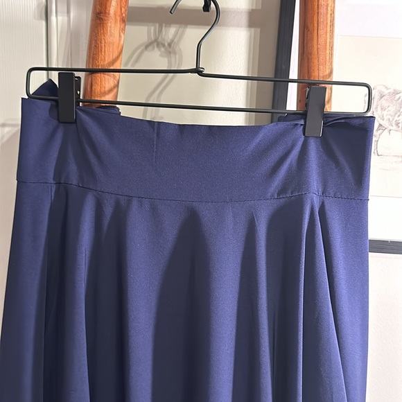 Yitemei Women’s High Waist Solid Swing Maxi Skirt w/Asymmetrical Hem & Pockets - Picture 6 of 16